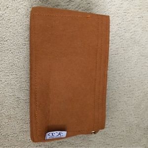 Purse insert with grommets